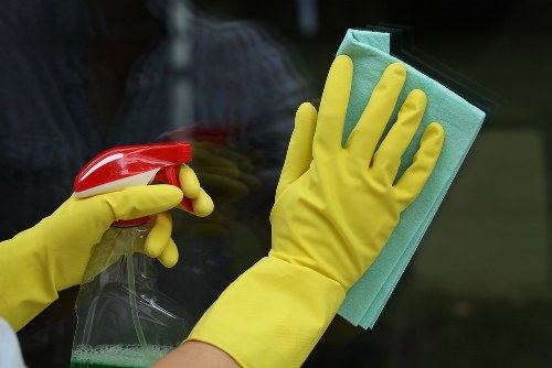 Professional carpet cleaning removing dirt from a living room carpet